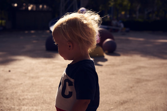 Tddler in nice light in playground