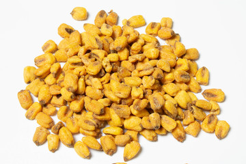 Roasted corn nuts on white background