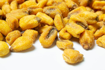 Roasted corn nuts on white background