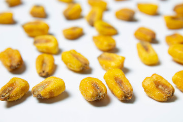 Roasted corn nuts on white background