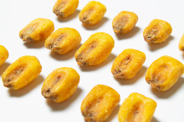 Roasted corn nuts on white background
