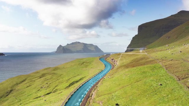 Self driving car system UI analysing path for safety, adas assistance systems, point of interests along coastal road. Electric autonomous car with augmented reality interface. Forward aerial flight