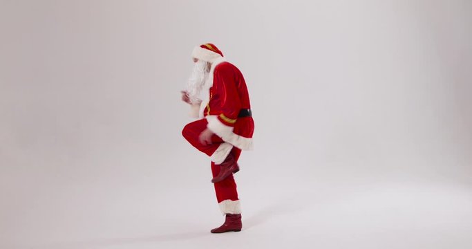 Crazy Santa dancing in joy on a white background - Slow Motion, Wide Shot