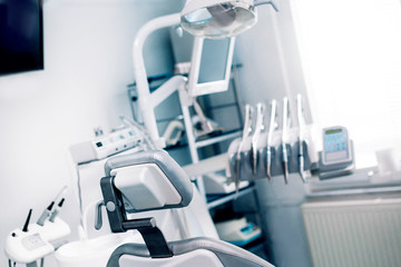 Dentist office with professional dental equipment.