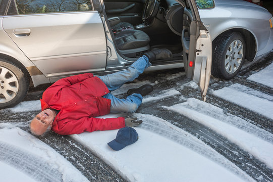 Senior man slipped on ice coming out of his car