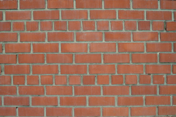 The texture of the brickwork of red brick. Structure, part of the wall.
