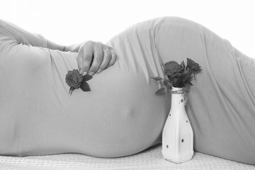 Pregnant woman on a white background