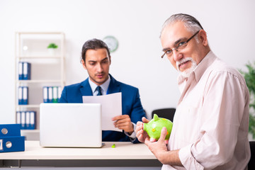 Financial advisor giving retirement advice to old man