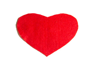 Heart made of felt on a white background.  A red heart cutted from felt