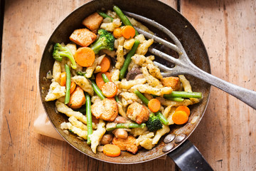 Chicken with dumplings, mushrooms, green beans, onions and carrots
