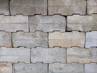 old brick wall, concrete block wall background. Gray beton blocks wall, seamless background photo texture.