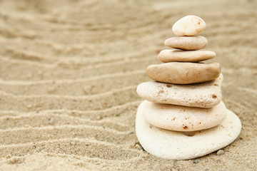 Fototapeta na wymiar Seashells on sand background