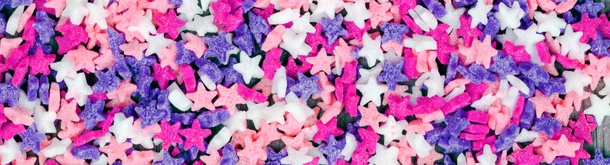 Long panorama of stars in sweet candy, for starry themes, and concepts of cooking, baking and food designs - creative & inspirational background texture / banner.