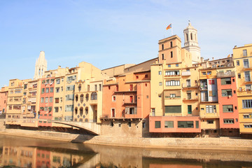 Naklejka na ściany i meble The amazing colorful houses along the river Onyar in the gorgeous city of Girona, Catalonia, Spain.