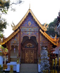 Beautifully decorated facade of Wat Phrathat Doi Southep in Chiangmai Thailand with many Buddha Statues
