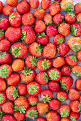 Fresh ripe red strawberries background. Natural red background.