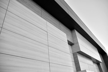 Obraz premium Abstract modern architecture with high contrast black and white tone. Architecture of geometry at glass window - monochrome.