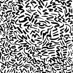 Black brush strokes on a white background.