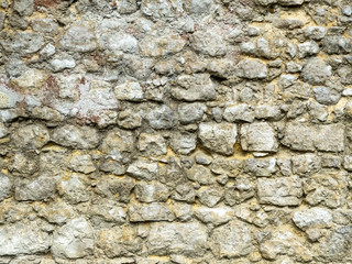 wall of large exposed stones belonging to a medieval castle