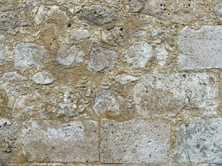 wall of large exposed stones belonging to a medieval castle