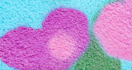 Beautiful bright colorful street art graffiti background. Abstract creative spray drawing fashion colors on the walls of the city. Urban Culture, black ,blue, purple , violet , neon texture