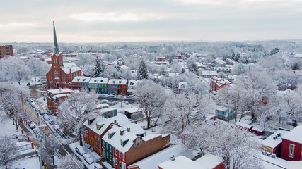 Winter morning, small American town covered in snow, idyllic landscape of colonial Lancaster, Pennsylvania after blizzard