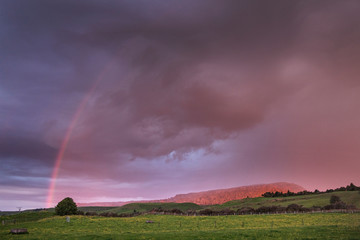 Naklejka na ściany i meble Tongariro National park Rainbow and sunset. New Zealand