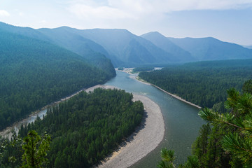Obraz na płótnie Canvas Aerial view of the valley of a mountain river. Siberia.