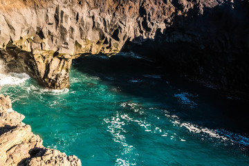 beautiful postcard landscape of Los Hervideros volcanic cliffs with atlantic waves in Lanzarote, Canary Islands, Spain - popular vacation destination
