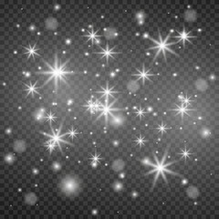 Sparkling magic dust particles. The light of a star. star glow on a transparent background explodes on a transparent background. White light. Bright Star.