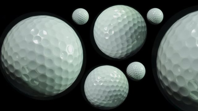 Golf. Ball games and sport. Many spinning golf balls close up.