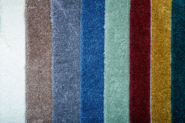 Carpet background. Striped carpets in different colors