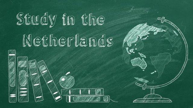 Lettering "Study in the Netherlands", rotating globe and school books are drawn with chalk on a blackboard. Study abroad concept.