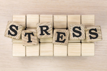 stress word written on building blocks concept