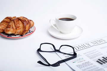 cup of coffee and newspaper