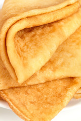 Traditional pancakes close up. Handmade. Isolated on background. Top view