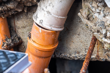 Broken pipes due to subsidence in the soil around the house