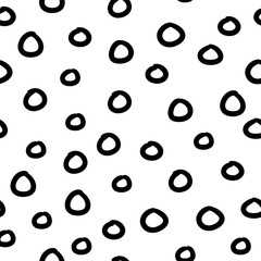 Vector illustration of seamless black dot pattern on white background. Black circles are randomly arranged. Graphic and modern design for scrapbooking, stationary, fashion and packaging design