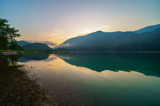 Summer sunrise landscape of the lake Corlo, Italy
