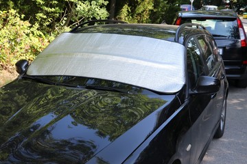 UV Reflecting Foldable Front Windshield Sun Shade on the Car 