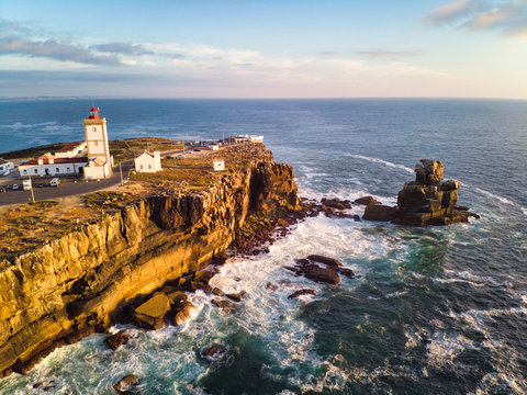 View Of Lighthouse And Sea In Peniche Portugal At Sunset