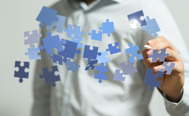 puzzle hand solution concept business.