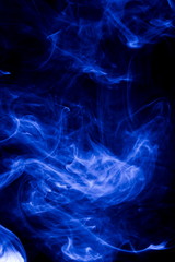 Obraz premium Blue smoke on black background