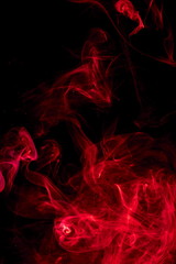 Fototapeta premium Red smoke on black background