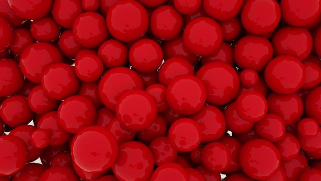 Background of falling red smooth spheres. 3d render