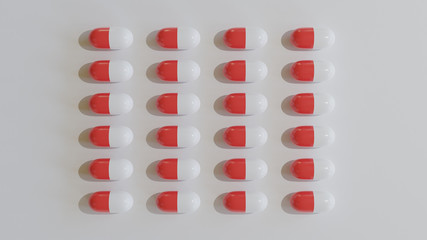 red and white pills against a white background, uniform