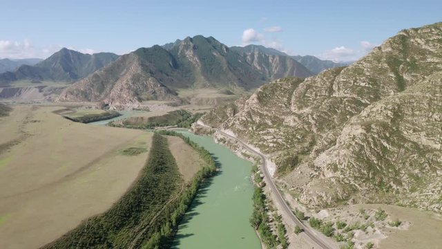 Katun River in desert valley of Altai Mountains, panoramic bird eye view. Summer morning landscape near Inya, Altai Republic, Siberia, Russia