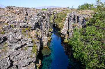 Fototapeta na wymiar Silfra crack with clear crystal water in Thingvellir national park