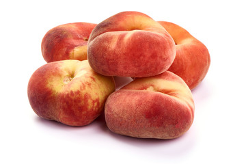 Flat Peaches, ripe nectarines, isolated on white background