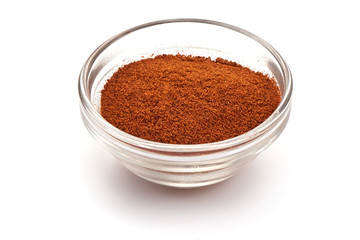 Dry red chili pepper, paprika powder, isolated on white background